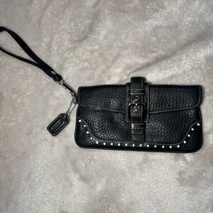 Vintage Coach Soho black leather buckle flap wristlet wallet